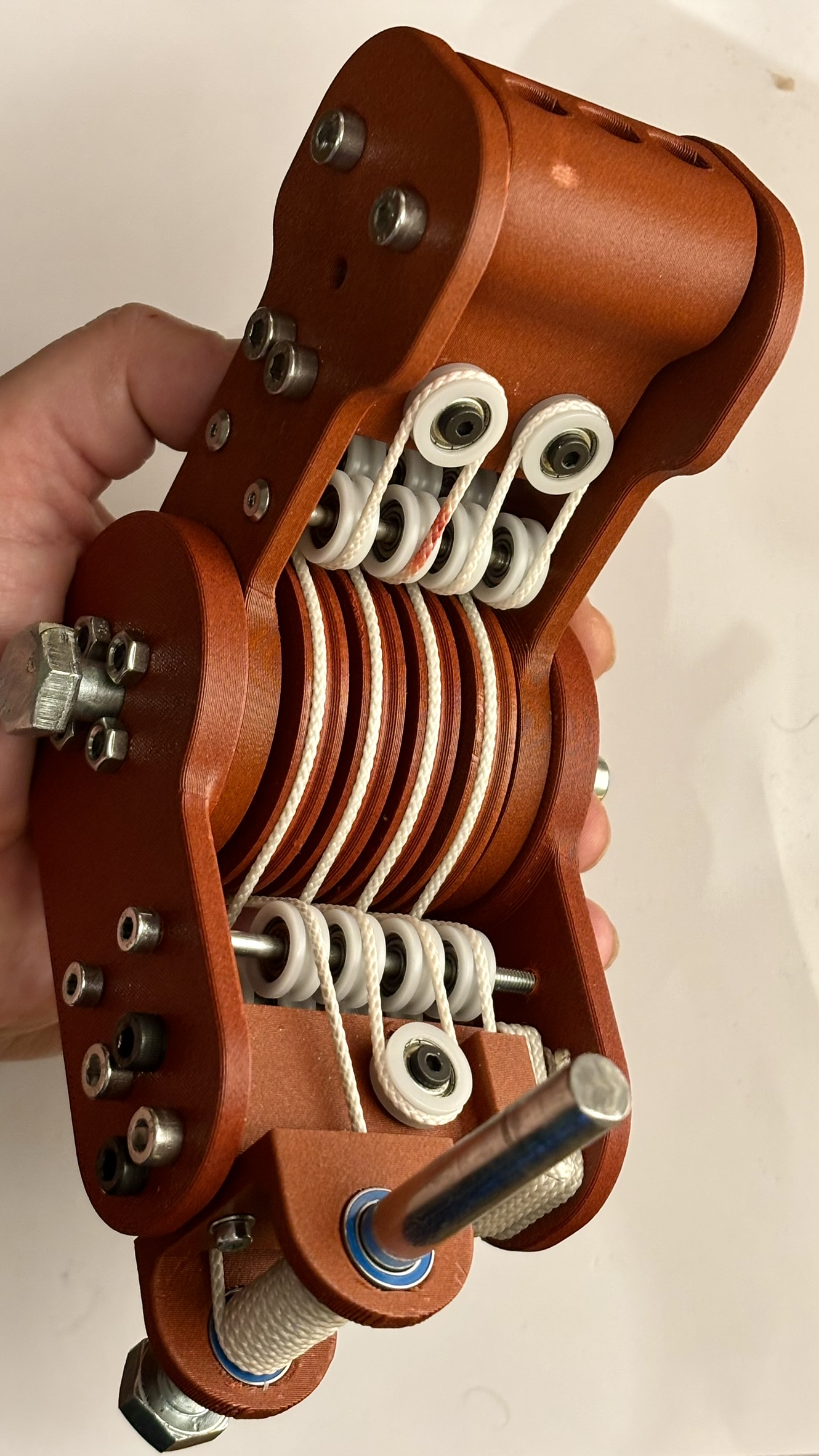 带集成块和滑车减少功能的电缆驱动接头